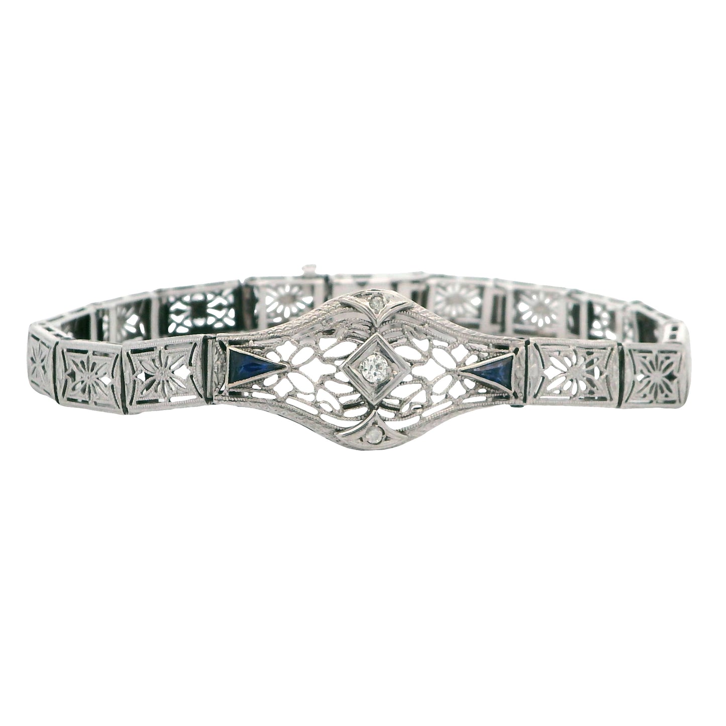 Silver bracelet with blue stones on a white background