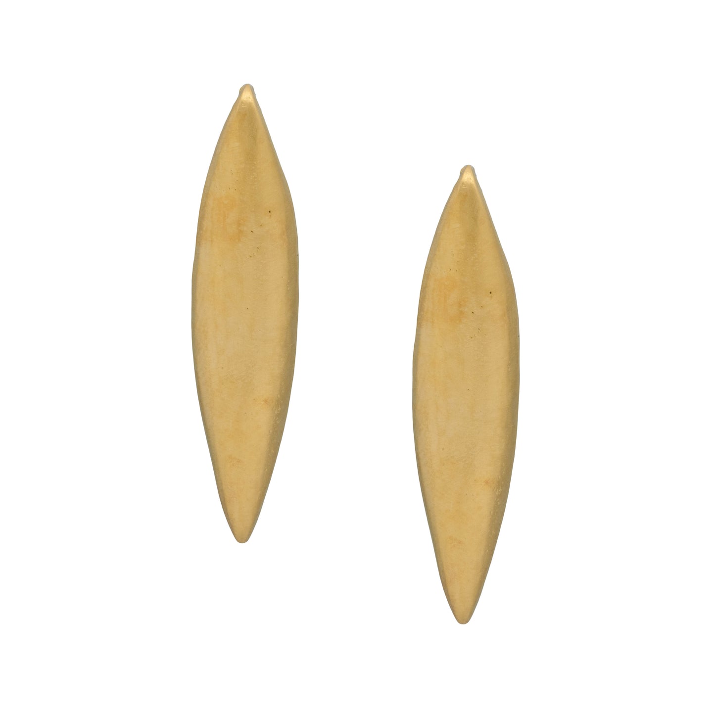 Pair of gold oval-shaped earrings on a white background