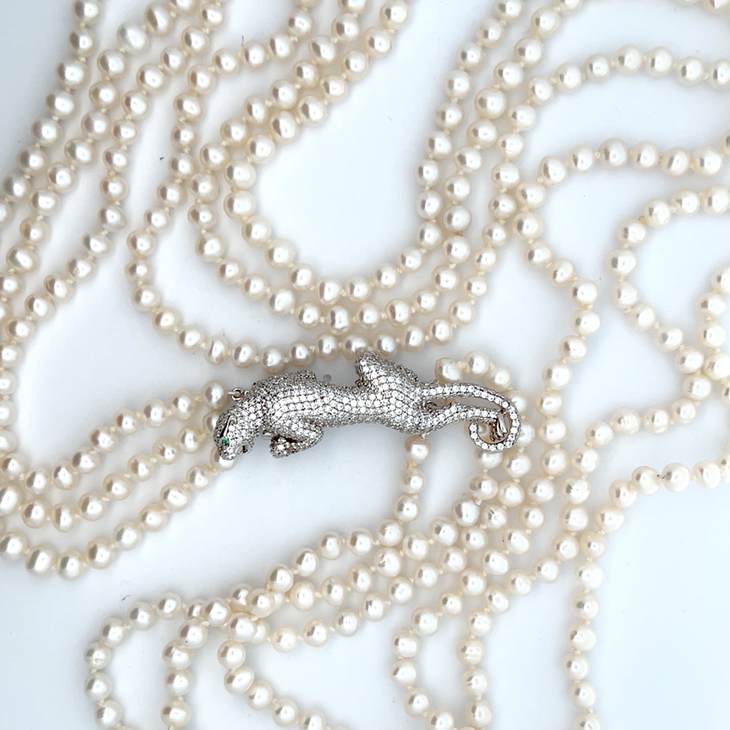 Triple Strand 31" Long Freshwater Pearls with Jaguar Clasp