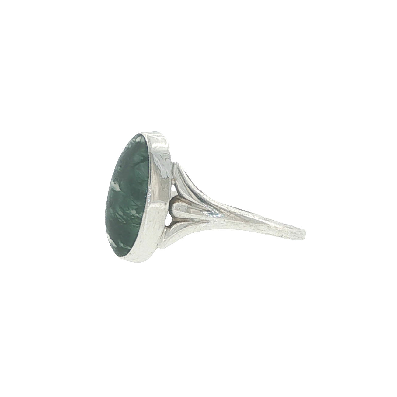 Silver ring with a green stone on a white background