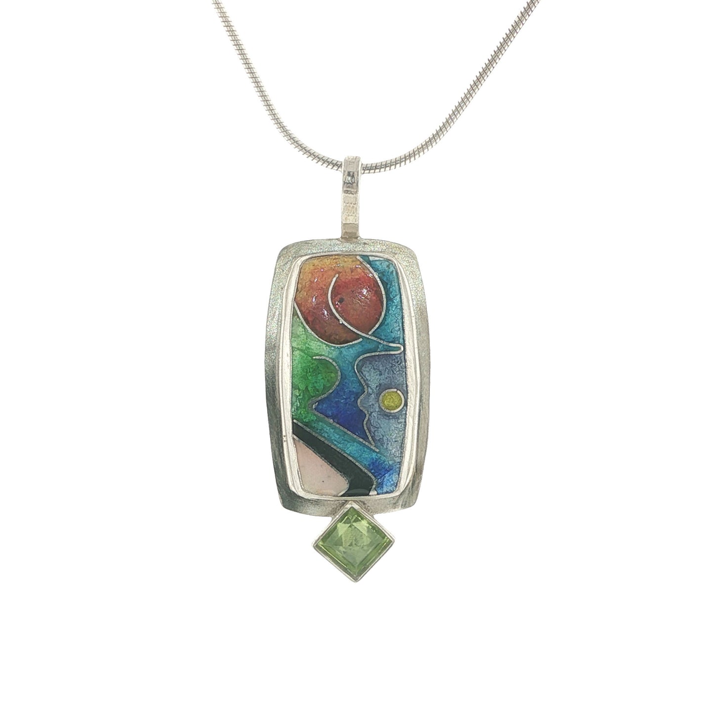 Colorful pendant necklace with a green gemstone on a white background